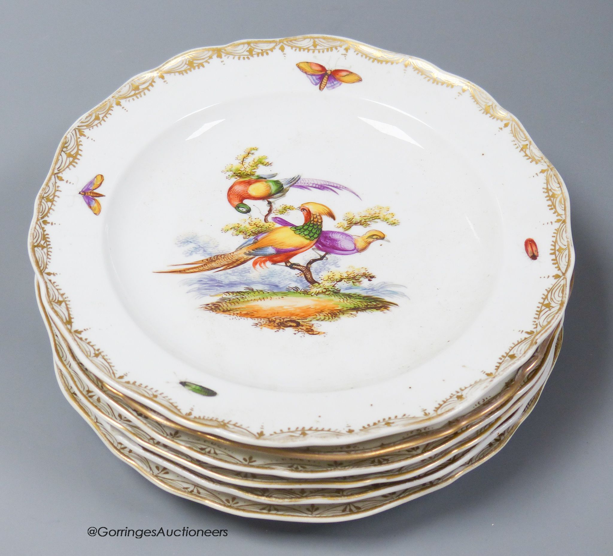 A set of six Meissen dessert dishes, painted with birds,factory seconds, 25.5cm diameter